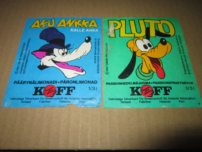 AKU ANKKA JA PLUTO ETIKETIT.
