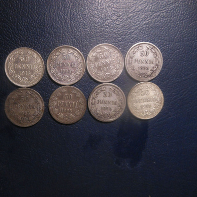 50 pennin kolikoita