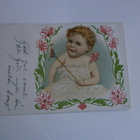 Vauva lelu kädessä (Uusi Vuosi), väripk,p.1903 - pikkukuva 1