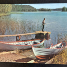 järven rannalla veneet, poika ongella, kulkenut 1963 - pikkukuva 1