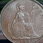Vuoden 1937 One Penny -kolikko muovikapselissa. Halkaisija 3 - pikkukuva 1