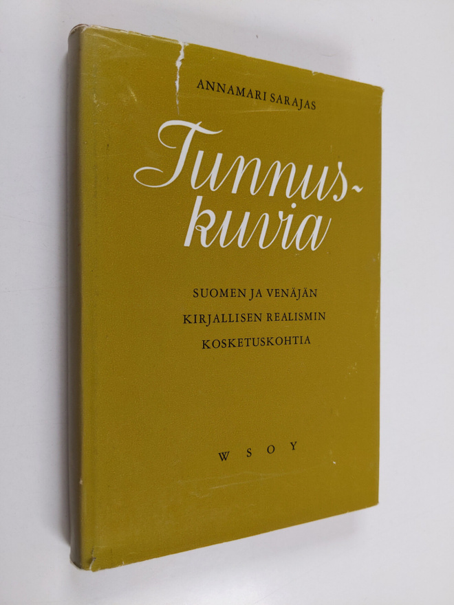 Annamari Sarajas : Tunnuskuvia : Suomen ja Venäjän kirjal...