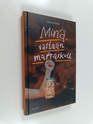 Laura Suomela : Minä vastaan marraskuu