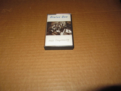 KASETTI: Status Quo: Ain`t Complaining v.1988 FINLAND