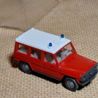 Mercedes-Benz	G280E paloauto	2004	punainen 1:87	Wiking - pikkukuva 1