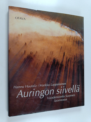Hannu Hautala ym. : Auringon siivellä : Vuodenkierto Suom...
