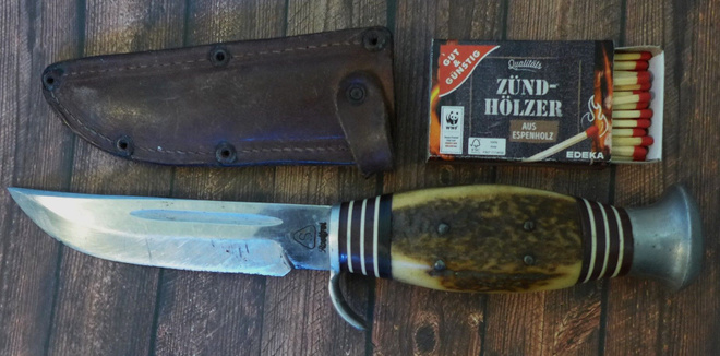 Puukko saksalainen jämäkkä koristeltu sormisuoja