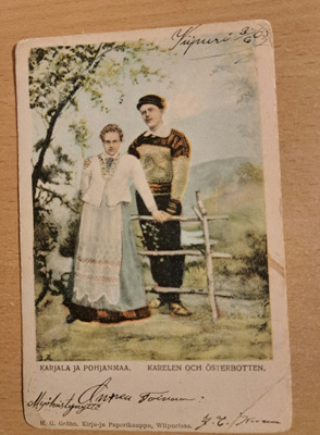 pariskunta kansanpuvuissa, kulkenut Wiipurissa 1905