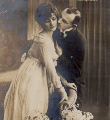 RAKKAUS / Mies antaa ujolle tytölle poskisuudelman. 1900-l.