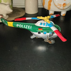 Vanha peltinen poliisi helikopteri - pikkukuva 1