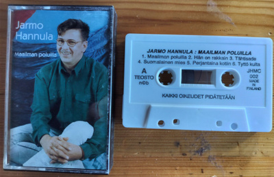 JARMO HANNULA-MAAILMAN POLUILLA-Kasetti, JHMC002