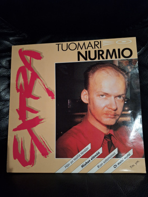 Tuomari Nurmio – Extra