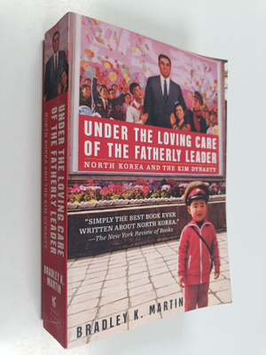 Bradley K. Martin : Under the loving care of the fatherly...
