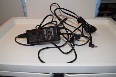delta electronics kannettavan virtalähde