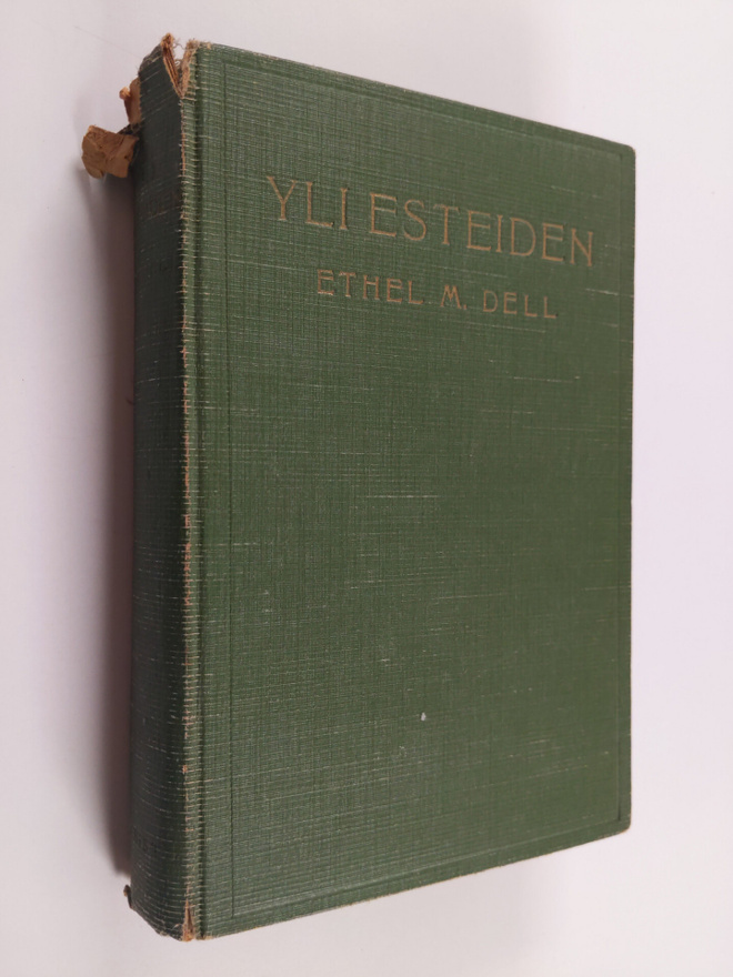 Ethel M. Dell : Yli esteiden : seuraelämä-romaani