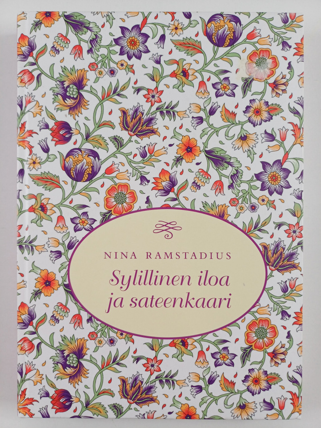 Nina Ramstadius : Sylillinen iloa ja sateenkaari