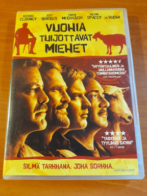 Vuohia tuijottavat miehet