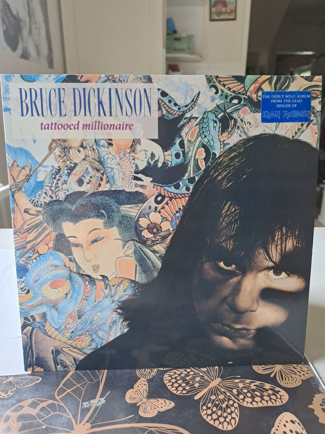 Bruce Dickinson tattoed millionare 1990