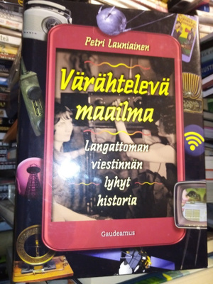 Launiainen : Värähtelevä maailma ( SIS POSTIKULU)