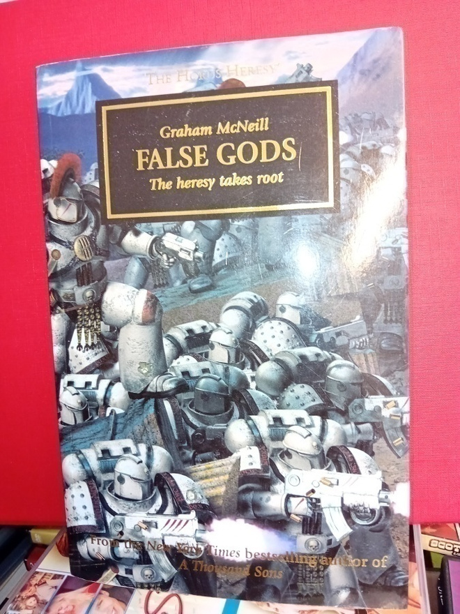McNeill : False Gods ( Iso pehmeäkantinen) SIS POSTIKULU