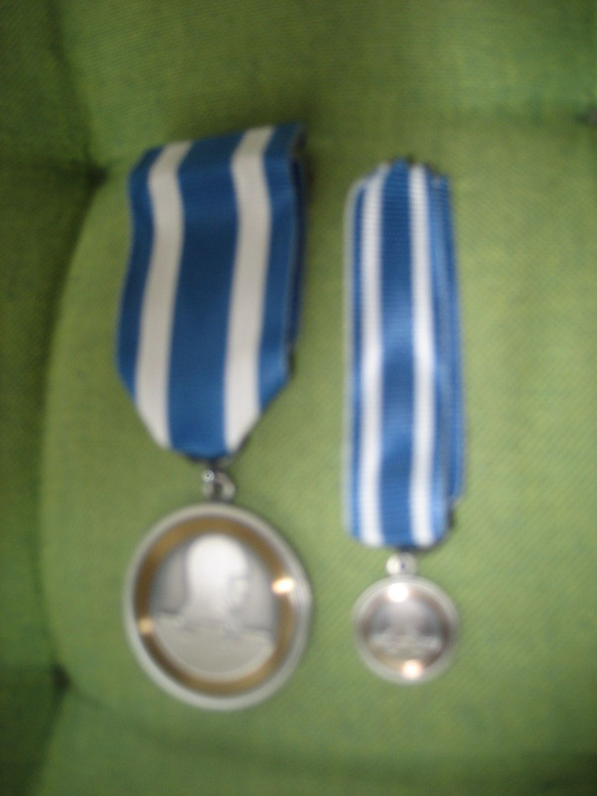 Sotaveteraani Liiton Ansiomitalit