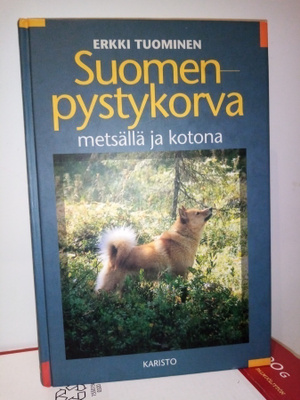 Tuominen : Suomen pystykorva metsällä ja kotona ( SIS POSTIK