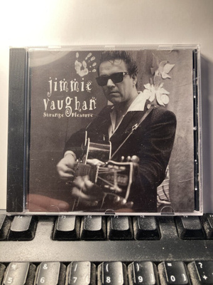 JIMMIE VAUGHAN: Strange Pleasure, CD