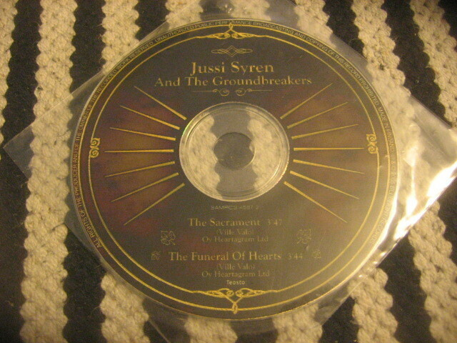 Jussi Syren and the Grounbreakers - The Sacrament (promo cds