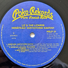 LIZ & THE LIZARDS : HERÄTKÄÄ VARTIOTORNI KAATUU  LP - pikkukuva 4