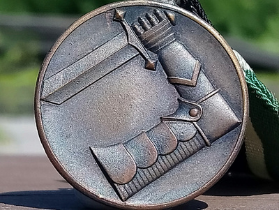 Suojeluskunnan kunniamerkki. Numeroitu. Halkaisija 30 mm. Pr