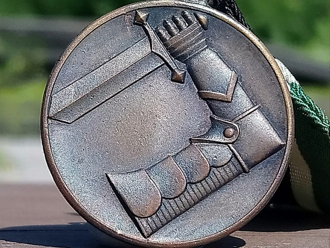 Suojeluskunnan kunniamerkki. Numeroitu. Halkaisija 30 mm. Pr