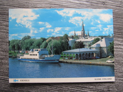 JOENSUU.....laiva rannassa - kirkko taustalla.