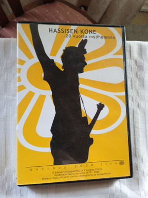 DVD- MUSIIKKI LEVY: HASSISEN KONE : 20 VUOTTA MYÖHEMMIN