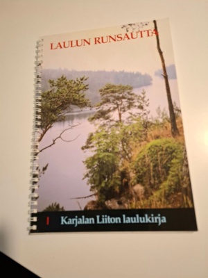 Karjalan liitto : Laulun runsautta , yhteislaulukirja
