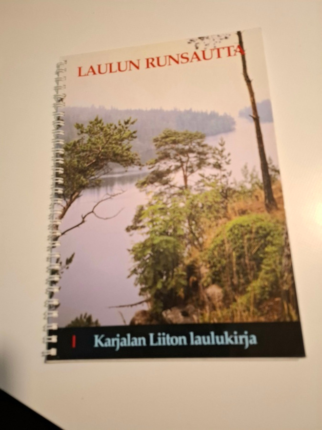 Karjalan liitto : Laulun runsautta  , yhteislaulukirja