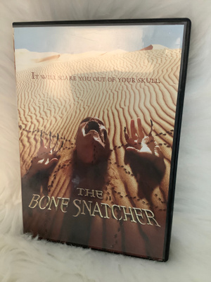 THE BONE SNATCHER