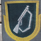 SA - Kankainen tunnus. Kivärimies. Koko - 84*67 mm. - pikkukuva 2