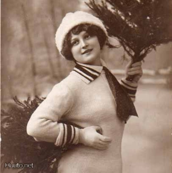 NAINEN / Tyttö neuleessa ja pienet joulukuuset. 1910-l.