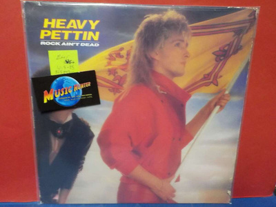 Heavy Pettin – Rock Ain't Dead EX+/VG+ LP