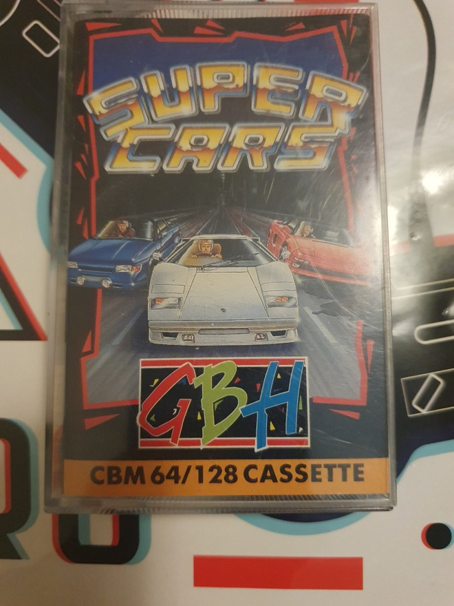 Supercars CBM 64/128 Cassette alkuperäisrasiassaan