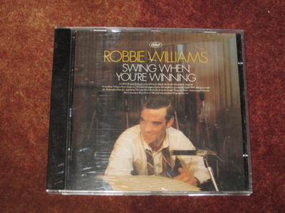 ROBBIE WILLIAMS - SWING WHEN YOU'RE WINNING - CD