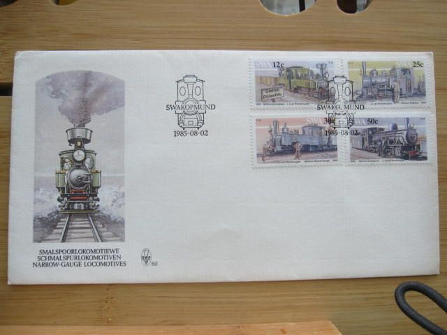 SWA 4 erinlaista kapearaide junaa kuorella 1985
