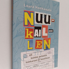 Laura Honkasalo : Nuukaillen, eli Kuinka pelastin kukkaro... - pikkukuva 1