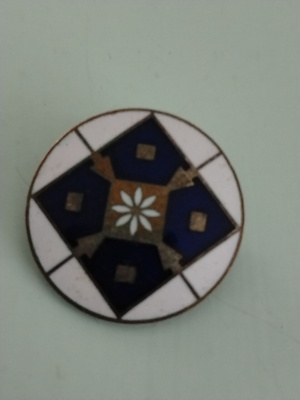 kodinhoitajaopiston merkki