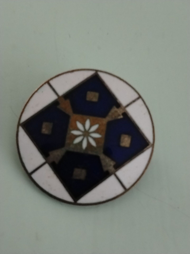 kodinhoitajaopiston merkki