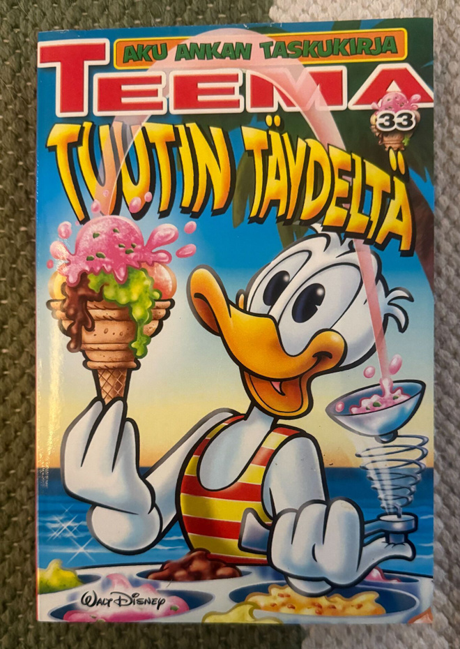 AKU ANKAN TASKUKIRJA TEEMA 33 - TUUTIN TÄYDELTÄ