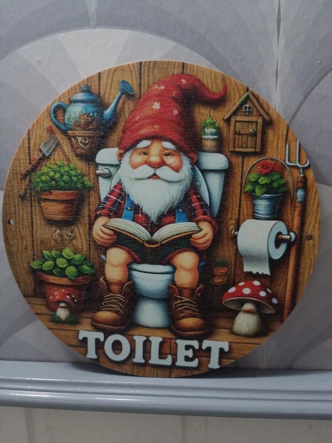 Puutarhatonttu toilet taulu