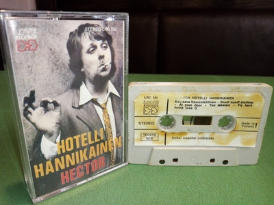 C-KASETTI : Hector :  Hotelli Hannikainen ( SIS POSTIKULU)