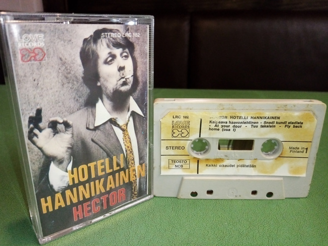 C-KASETTI : Hector :  Hotelli Hannikainen ( SIS POSTIKULU)