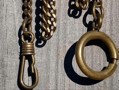 taskukellon perät Pronssi väri. Pituus - 23 mm. Hyväkuntoise